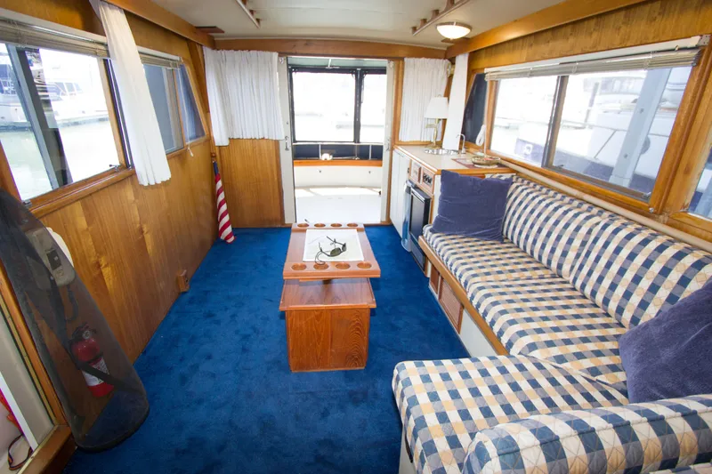 Slide: The Image of Interior of a 1984 Californian LRC yacht with blue carpet. - 8