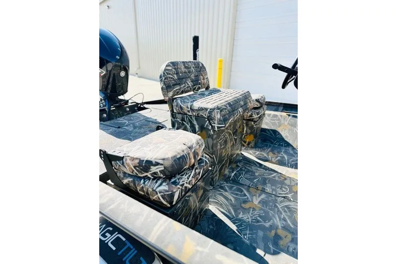 Slide: The Image of Camouflage seating on 2026 War Eagle 961 Blackhawk boat, featuring durable design. - 5