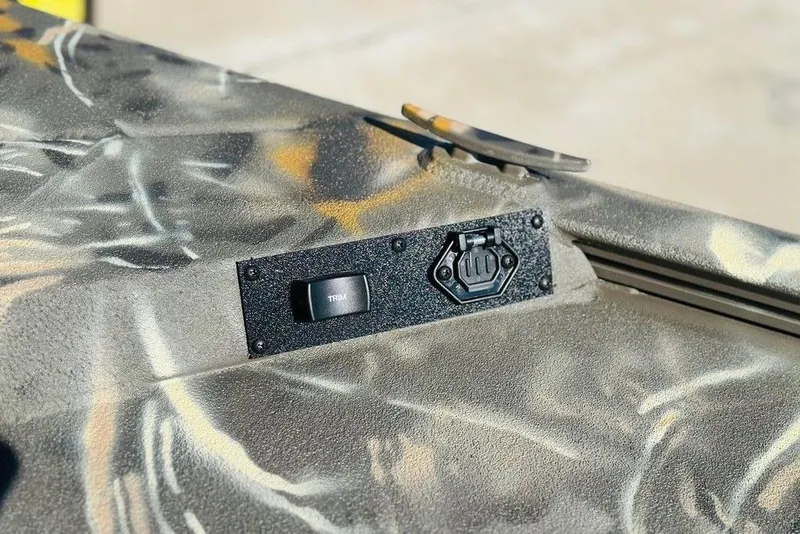 Slide: The Image of Camouflage detail on 2026 War Eagle 961 Blackhawk boat with trim switch. - 8