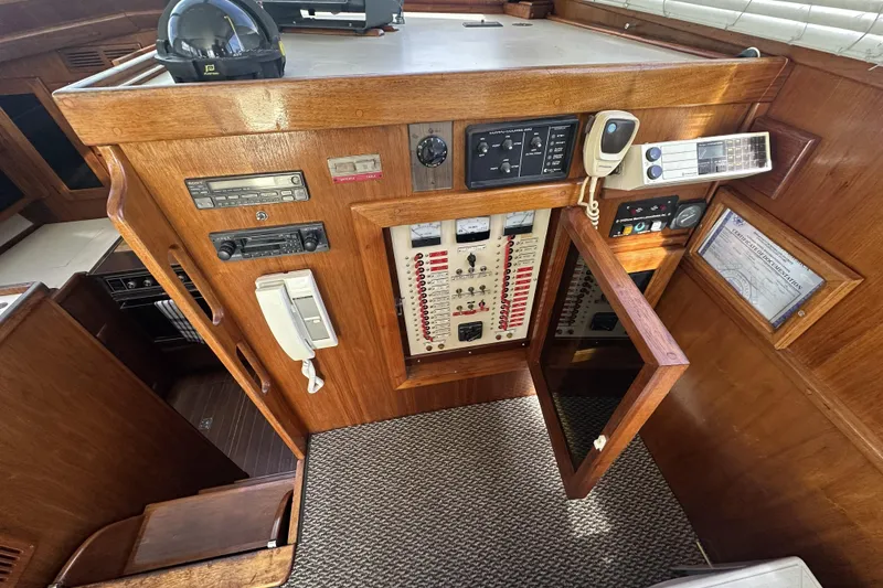 Slide: The Image of Control panel of a 1987 Californian 34 yacht with communication devices and navigation equipment. - 10