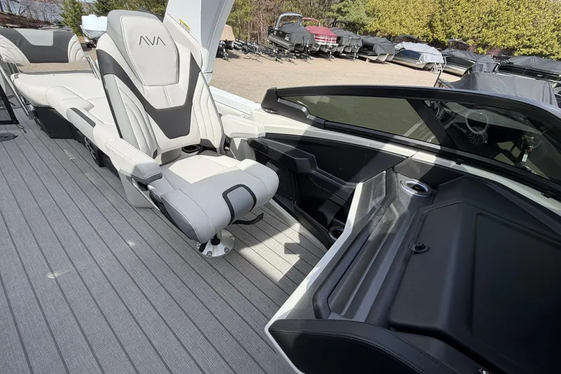 Slide: The Image of 2026 Avalon Excalibur Quad Lounge boat interior with luxurious seating and sleek design. - 14