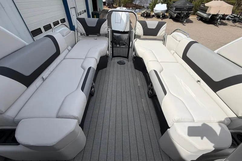 Slide: The Image of Luxurious seating on 2026 Avalon Excalibur Quad Lounge Windshield pontoon boat. - 16
