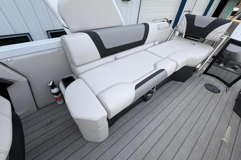 Slide: The Image of 2026 Avalon Excalibur Quad Lounge Windshield boat interior with luxurious seating and modern design. - 17