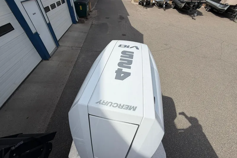 Slide: The Image of Mercury 450R outboard engine on Avalon Excalibur Quad Lounge Windshield boat, 2026 model. - 22