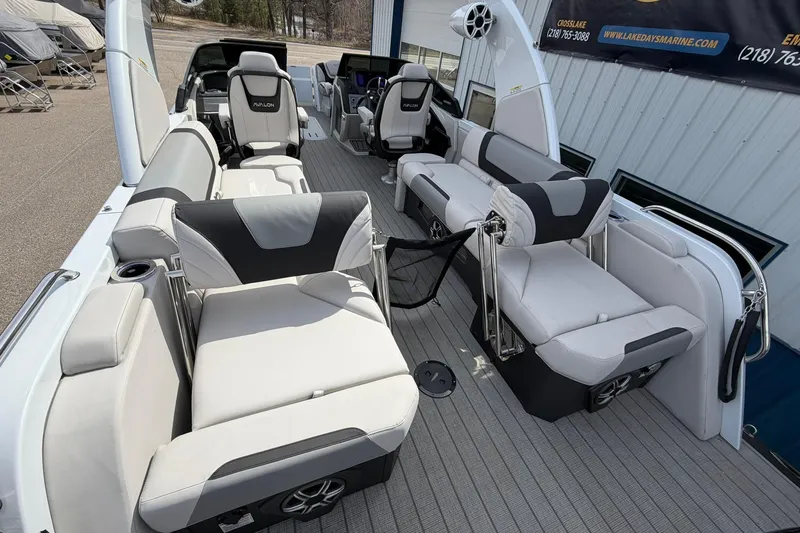 Slide: The Image of Luxurious 2026 Avalon Excalibur Quad Lounge boat interior with plush seating and modern design. - 23