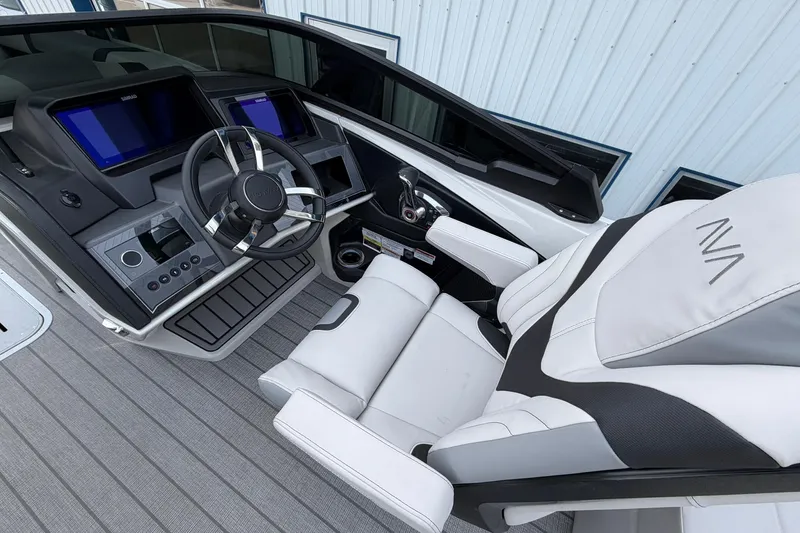 Slide: The Image of Luxurious helm of 2026 Avalon Excalibur Quad Lounge Windshield boat, featuring advanced controls and seating. - 30