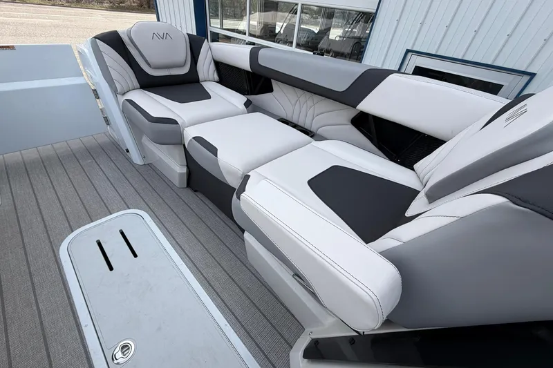 Slide: The Image of Luxurious seating on 2026 Avalon Excalibur Quad Lounge Windshield boat, featuring sleek design and comfort. - 34