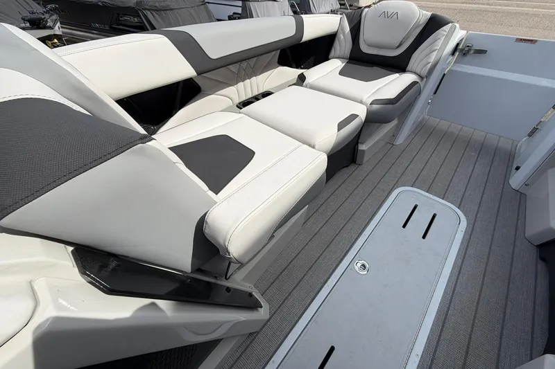 Slide: The Image of Luxurious seating on 2026 Avalon Excalibur Quad Lounge Windshield boat, featuring sleek design. - 35