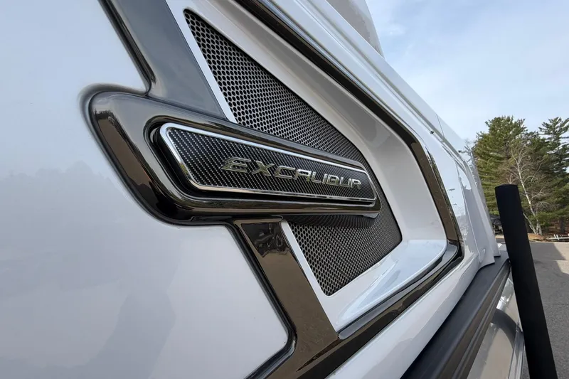 Slide: The Image of 2026 Avalon Excalibur Quad Lounge Windshield boat detail with sleek design and branding. - 8