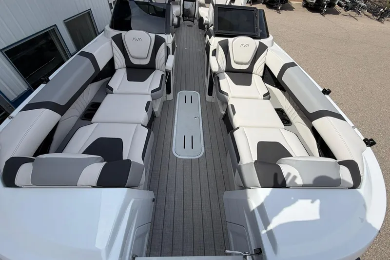 Slide: The Image of Luxurious seating on 2026 Avalon Excalibur Quad Lounge Windshield boat, featuring sleek design and comfort. - 9