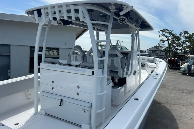 Slide: The Image of 2026 Contender 39 ST boat with sleek design and modern seating. - 11