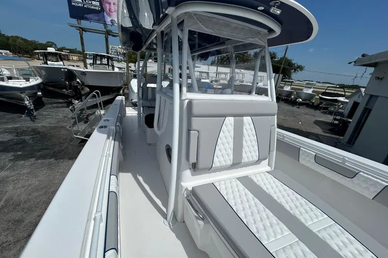 Slide: The Image of 2026 Contender 39 ST boat with sleek white interior and modern design. - 24