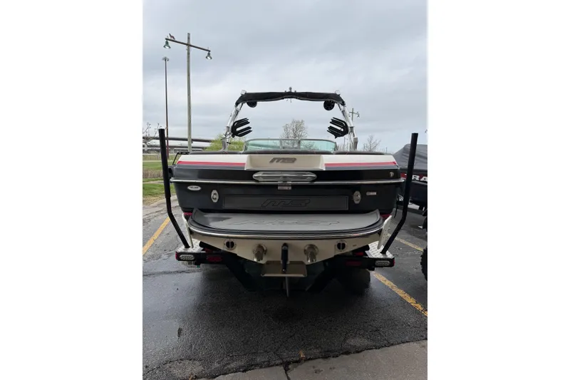 Slide: The Image of 2014 MBSPORTS B523 23V boat, rear view, parked on wet pavement. - 5