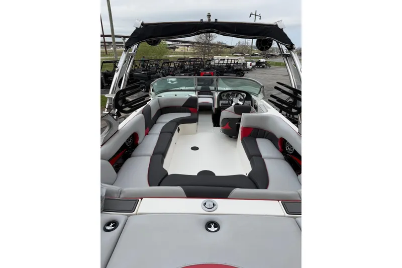 Slide: The Image of 2014 MBSPORTS B523 23V boat interior with spacious seating and modern dashboard. - 6