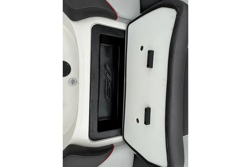 Slide: The Image of 2014 MBSPORTS B523 23V boat storage compartment with open lid and black interior. - 8