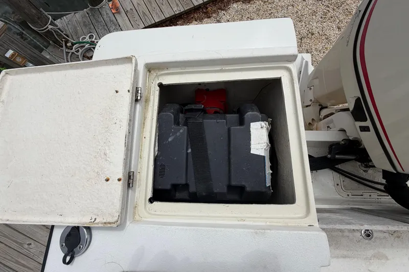 Slide: The Image of Battery compartment of a 1985 SeaCraft SC 23 Classic boat, open for inspection. - 33