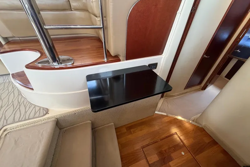 Slide: The Image of Interior of 2006 Sea Ray 44 Sedan Bridge yacht with elegant wood and leather finishes. - 34