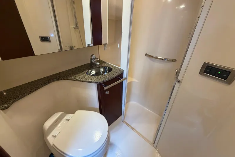 Slide: The Image of Luxurious bathroom in 2006 Sea Ray 44 Sedan Bridge yacht with modern fixtures. - 41