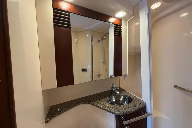 Slide: The Image of Luxurious bathroom interior of 2006 Sea Ray 44 Sedan Bridge yacht. - 42