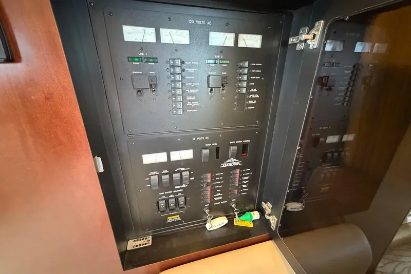 Slide: The Image of Electrical control panel on a 2006 Sea Ray 44 Sedan Bridge yacht. - 50