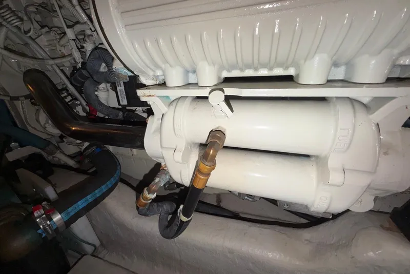 Slide: The Image of Engine compartment of a 2006 Sea Ray 44 Sedan Bridge, showcasing fuel system components. - 65