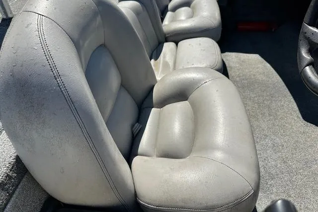 Slide: The Image of 2007 Skeeter ZX250 boat interior with gray leather seats. - 10