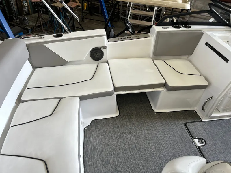 Slide: The Image of Interior of a 2022 Glastron 205 GTD boat with gray upholstery. - 8