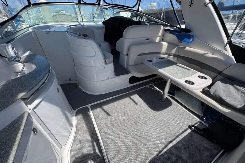 Slide: The Image of Interior of 2006 Chaparral Signature 350 yacht with seating and table. - 11