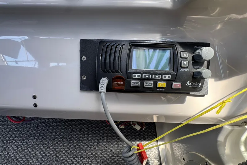 Slide: The Image of VHF radio system on 2006 Chaparral Signature 350 boat dashboard. - 28