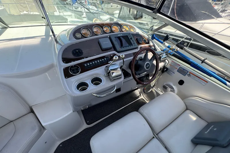 Slide: The Image of 2006 Chaparral Signature 350 boat cockpit with steering wheel and control panel. - 29