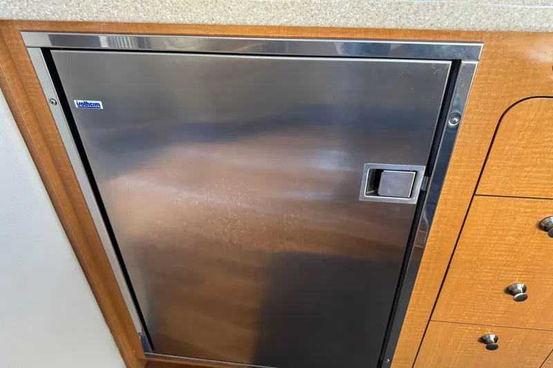 Slide: The Image of Stainless steel fridge in 2006 Chaparral Signature 350 yacht interior. - 38
