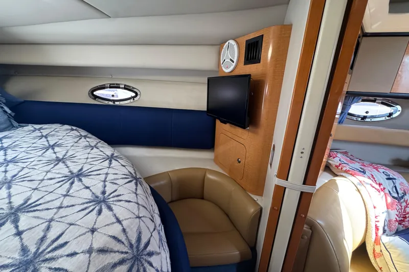 Slide: The Image of Interior of 2006 Chaparral Signature 350 yacht with cozy seating and modern amenities. - 44