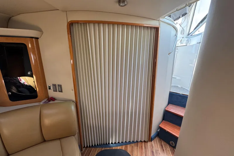 Slide: The Image of Interior of 2006 Chaparral Signature 350 yacht with seating and stairs. - 51