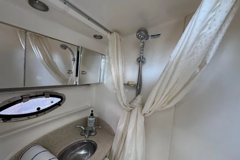 Slide: The Image of Bathroom interior of 2006 Chaparral Signature 350 yacht with shower and sink. - 55