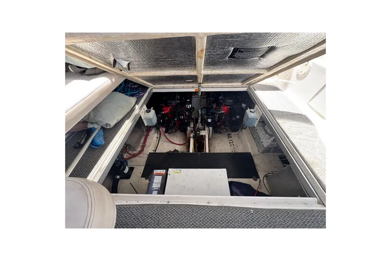 Slide: The Image of Engine compartment of a 2006 Chaparral Signature 350 boat, showcasing mechanical components. - 57