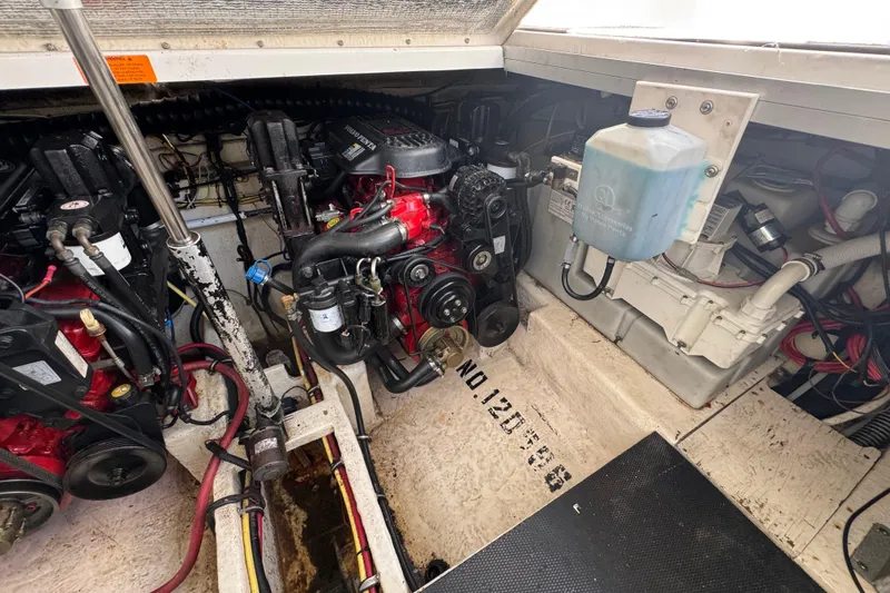 Slide: The Image of Engine compartment of a 2006 Chaparral Signature 350 boat, showcasing mechanical components. - 59