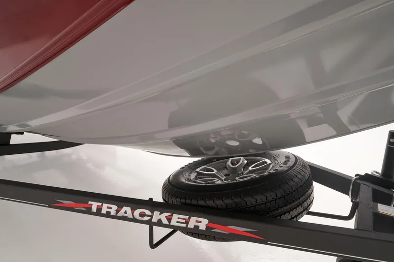 Slide: The Image of 2023 Tracker Pro Team 195 TXW Tournament Edition boat interior with seating and control panel. - 10