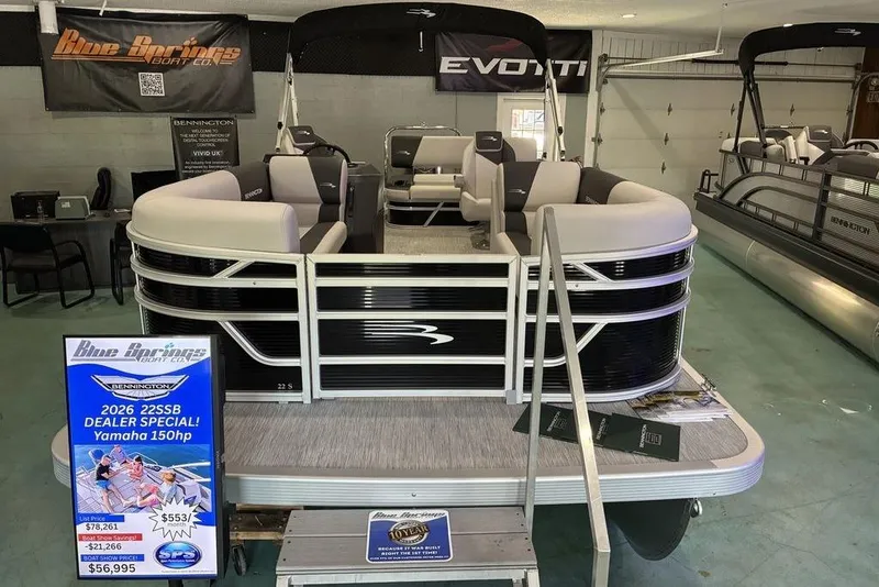 Slide: The Image of 2026 Bennington SWINGBACK 22 pontoon boat on display at Blue Brothers Boat Co. showroom. - 3