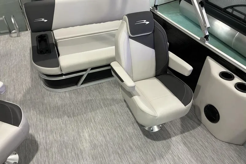 Slide: The Image of 2026 Bennington SWINGBACK 22 boat interior with plush seating and modern design. - 5