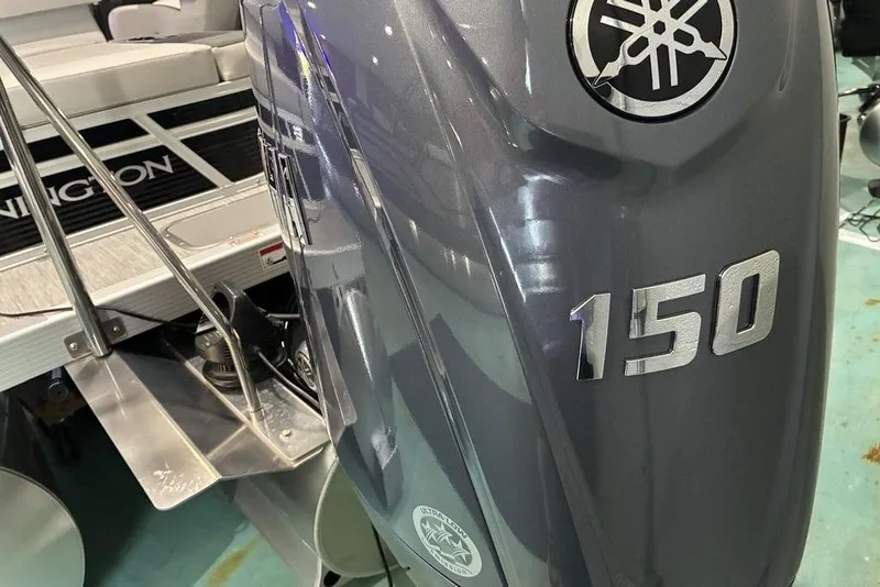 Slide: The Image of 2026 Bennington SWINGBACK 22 with Yamaha 150 outboard motor, close-up view. - 6