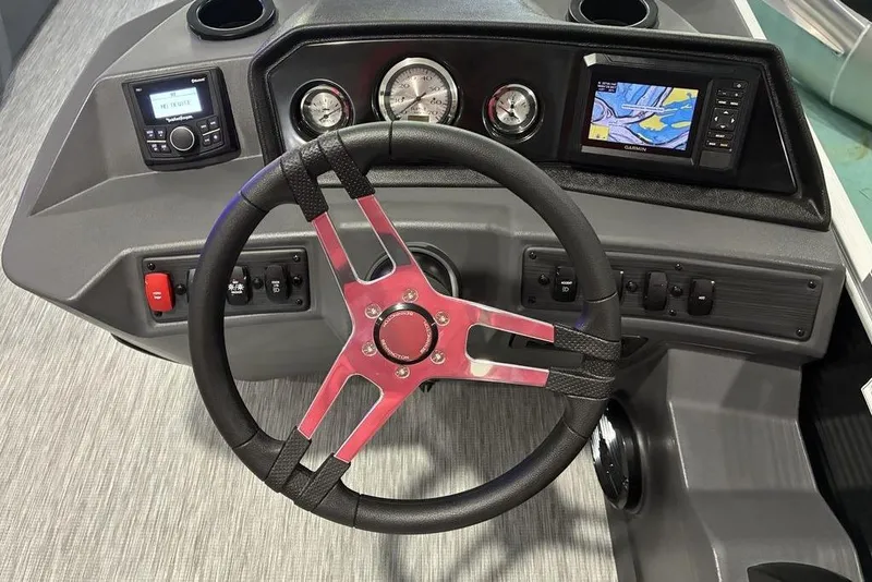 Slide: The Image of Steering console of 2026 Bennington SWINGBACK 22 with modern controls and navigation display. - 7