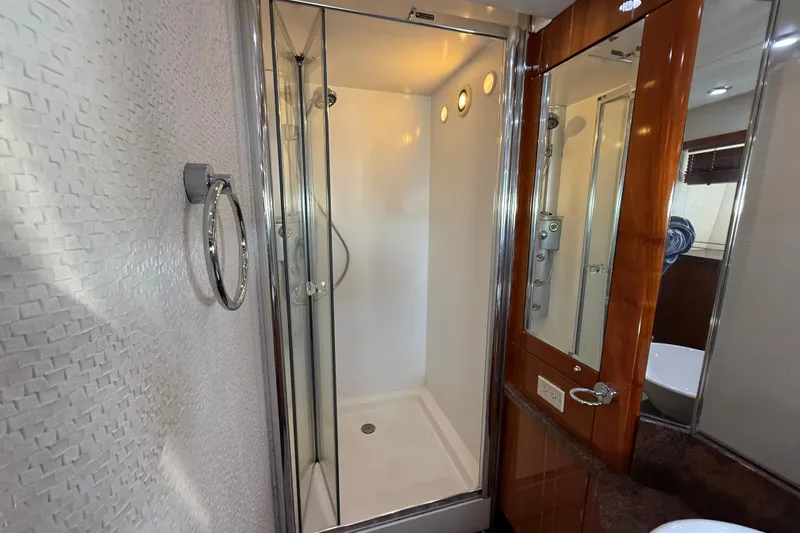 Slide: The Image of Luxurious bathroom in 2005 Sunseeker 75 Yacht with modern shower and elegant wood accents. - 20