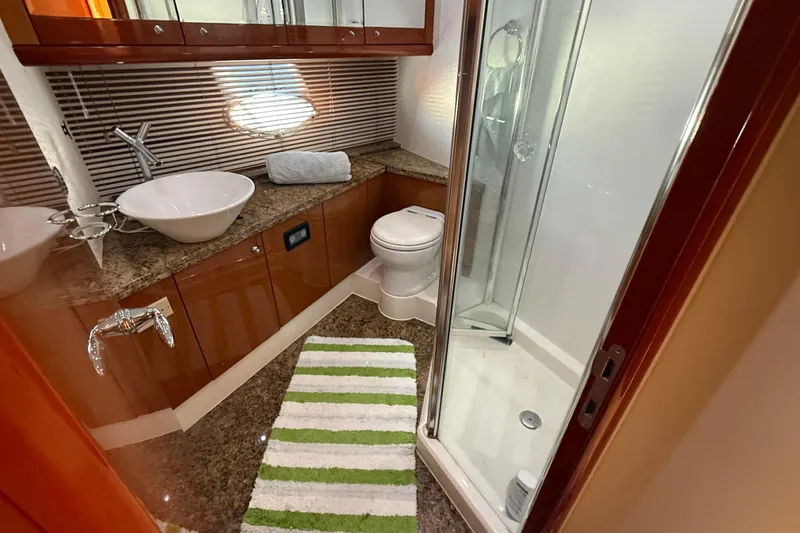 Slide: The Image of Luxurious bathroom in 2005 Sunseeker 75 Yacht with modern fixtures and shower. - 28