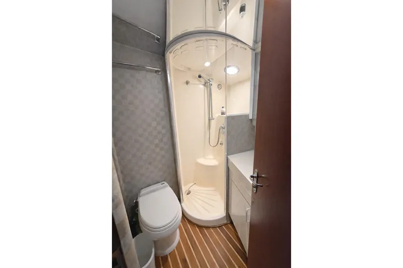 Slide: The Image of Bathroom of the 1990 Hatteras 58 Convertible yacht. - 5