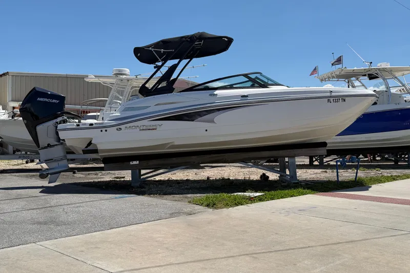 The Image of 2023 Monterey M-45 boat with Mercury engine on display at a marina. - 0