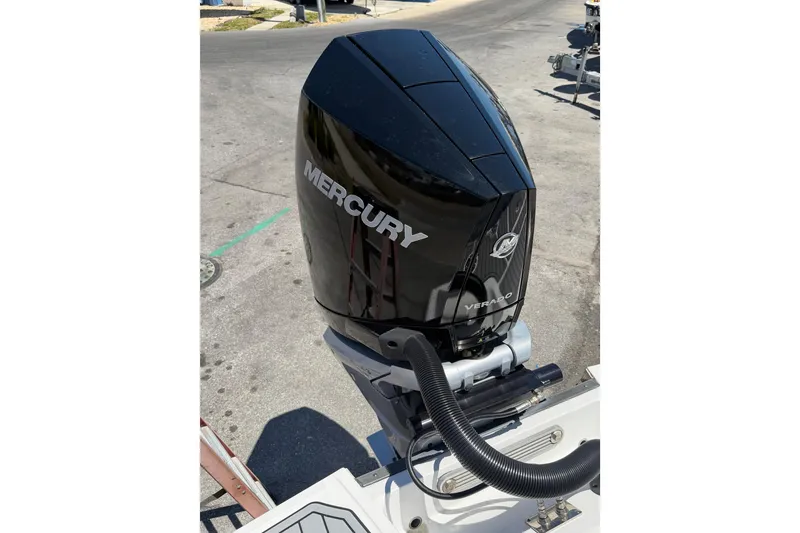 Slide: The Image of ```json "2023 Monterey M-45 boat with Mercury Verado outboard engine on display." ``` - 10