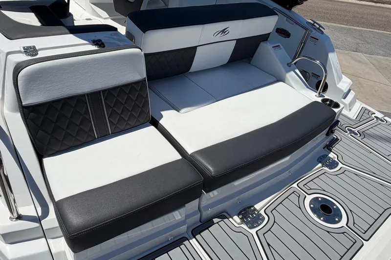 Slide: The Image of Luxury seating on 2023 Monterey M-45 boat with stylish black and white upholstery. - 11