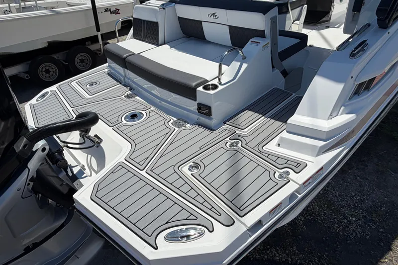 Slide: The Image of 2023 Monterey M-45 boat deck with sleek seating and modern design elements. - 12