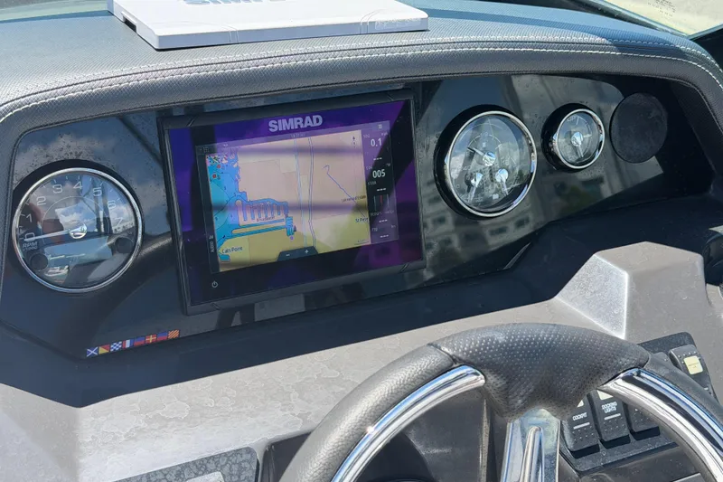 Slide: The Image of Dashboard of 2023 Monterey M-45 boat with Simrad navigation display. - 18