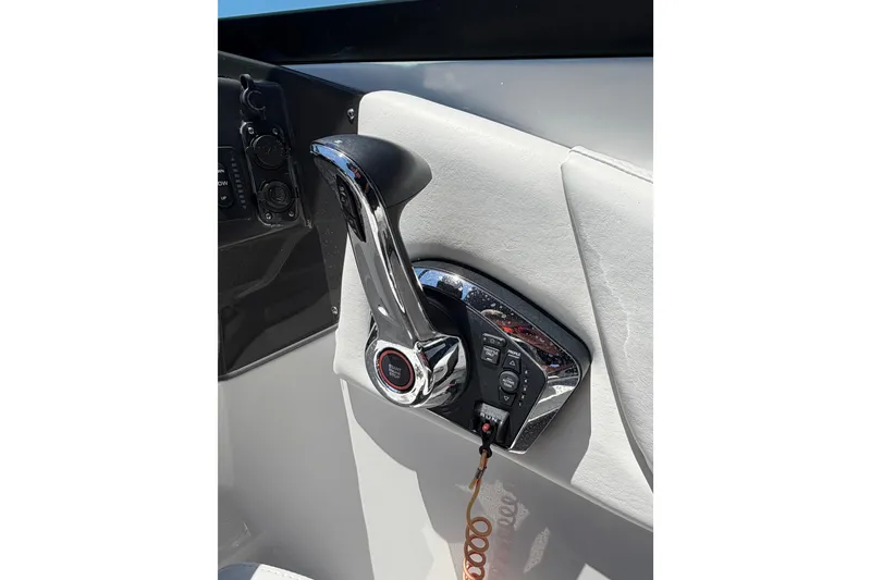 Slide: The Image of Chrome throttle control on 2023 Monterey M-45 boat, featuring sleek design and ergonomic handle. - 20